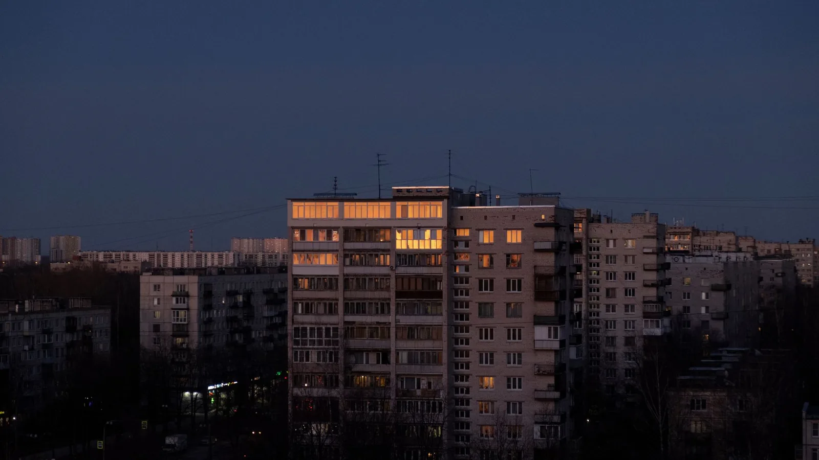 Modern residential apartment towers at dusk in Gurgaon